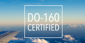 picture of plane wing in sky with do-160 certified disclaimer overlay for airborne products